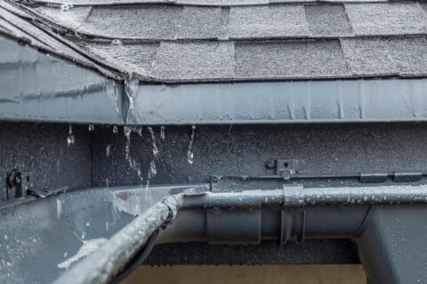 jets,of,rain,drain,into,the,drainage,system,on,the