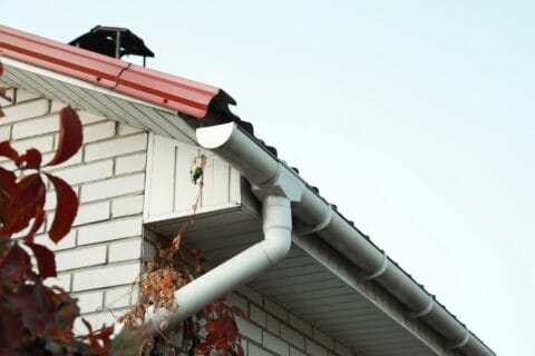 rain,gutter,system,with,drainpipe,on,house,outdoors