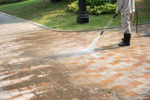 outdoor,floor,cleaning,with,a,pressure,water,jet,on,street